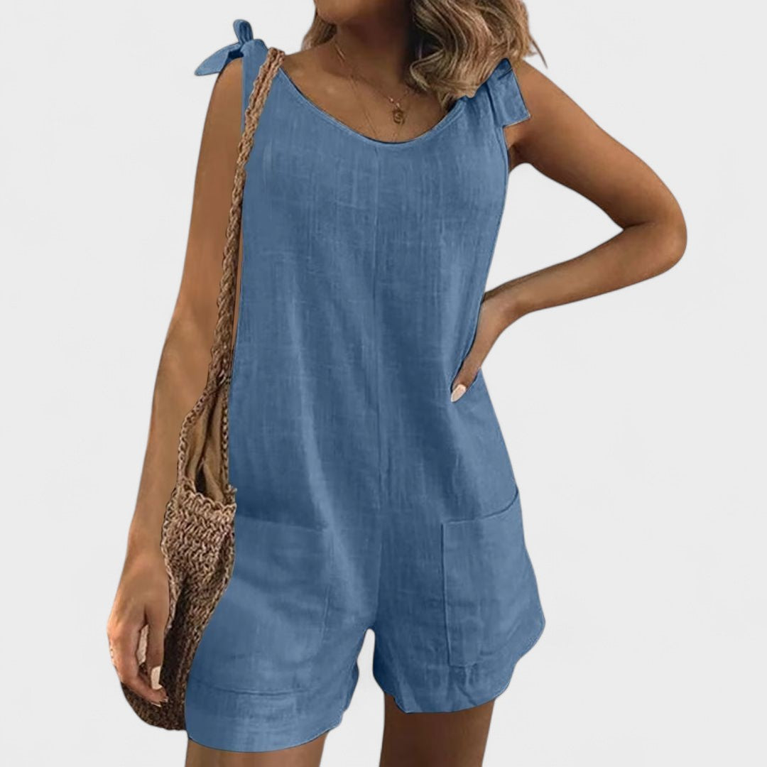 Yolanda - Jumpsuit su kišenėmis ant pečių ir kaspinu