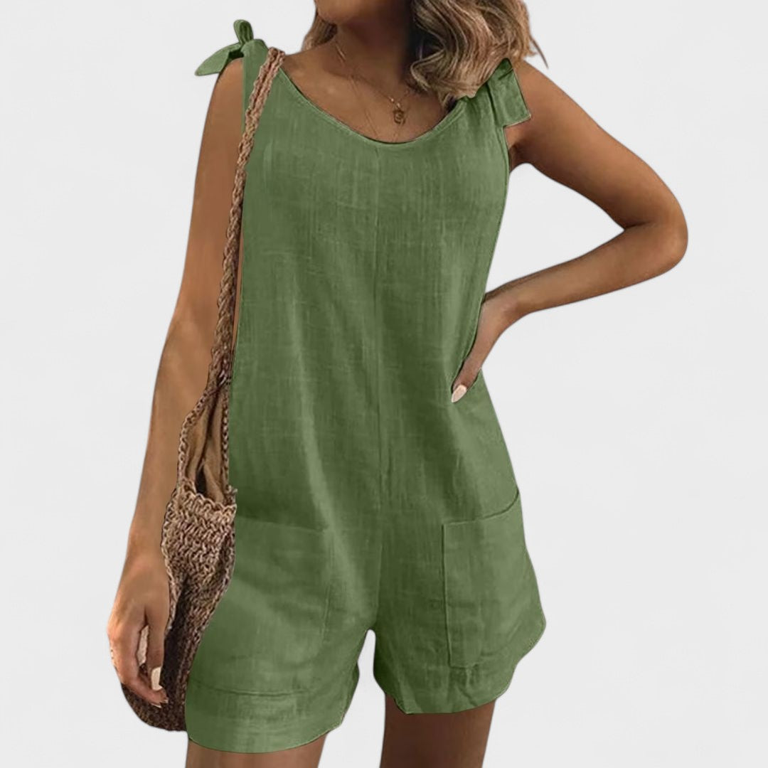 Yolanda - Jumpsuit su kišenėmis ant pečių ir kaspinu