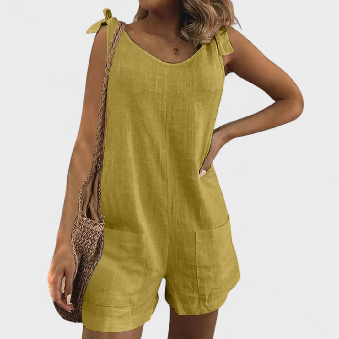 Yolanda - Jumpsuit su kišenėmis ant pečių ir kaspinu